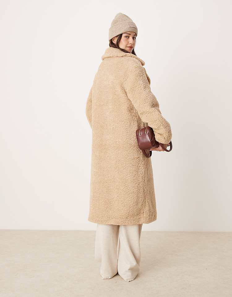 Glamorous beige faux fur long coat