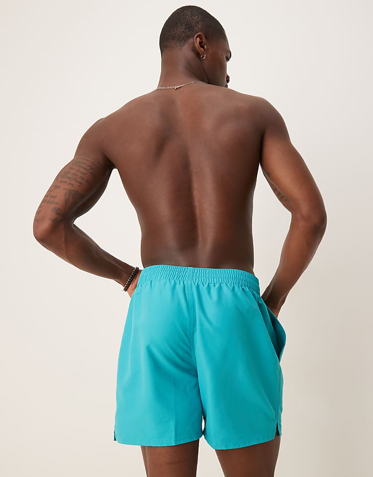 https://images.asos-media.com/products/nike-essential-lap-5-inch-volley-swim-shorts-in-bicoastal-green/207808148-3?$n_750w$&wid=750&fit=constrain