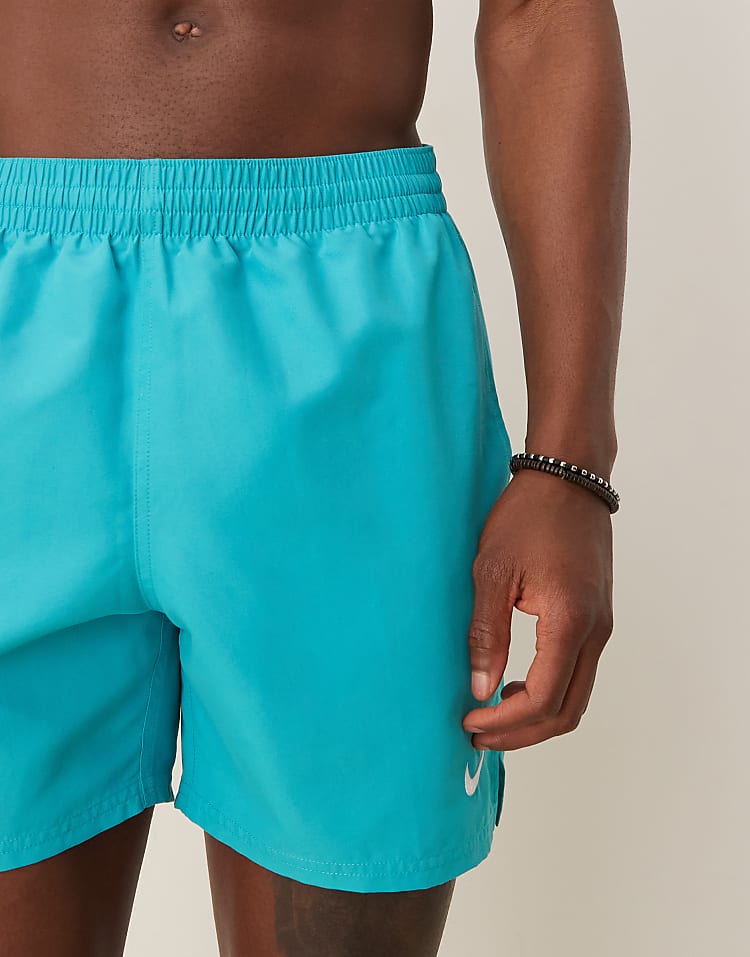 https://images.asos-media.com/products/nike-essential-lap-5-inch-volley-swim-shorts-in-bicoastal-green/207808148-4?$n_750w$&wid=750&fit=constrain