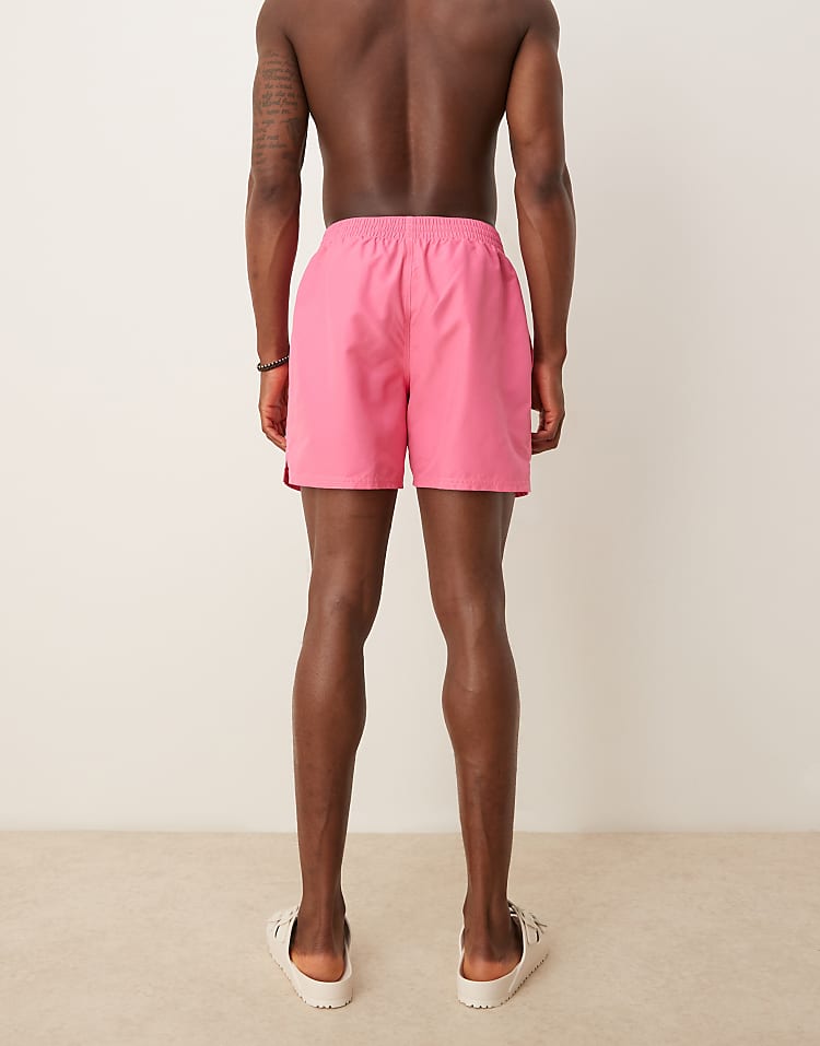 https://images.asos-media.com/products/nike-essential-lap-5-inch-volley-swim-shorts-in-pink/207808149-4?$n_750w$&wid=750&fit=constrain