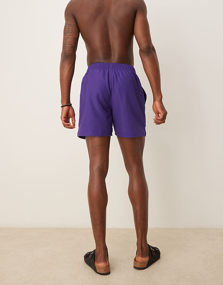 https://images.asos-media.com/products/nike-essential-lap-5-inch-volley-swim-shorts-in-purple/207808179-4?$n_750w$&wid=750&fit=constrain