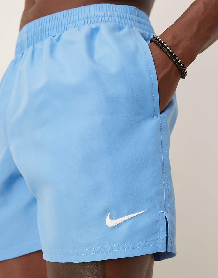 https://images.asos-media.com/products/nike-essential-lap-5-inch-volley-swim-shorts-in-blue/207808211-2?$n_750w$&wid=750&fit=constrain