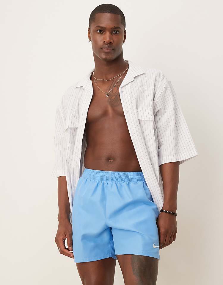 https://images.asos-media.com/products/nike-essential-lap-5-inch-volley-swim-shorts-in-blue/207808211-3?$n_750w$&wid=750&fit=constrain