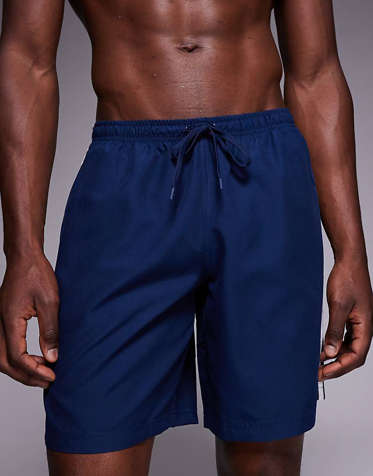 https://images.asos-media.com/products/adidas-originals-adicolor-swim-shorts-in-navy/207980467-5?$n_750w$&wid=750&fit=constrain