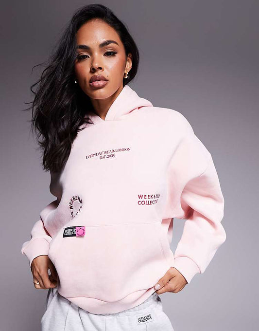 https://images.asos-media.com/products/weekend-collective-hoodie-with-bright-pink-label-detail-in-washed-pink/208832015-1-pink?$n_750w$&wid=750&fit=constrain