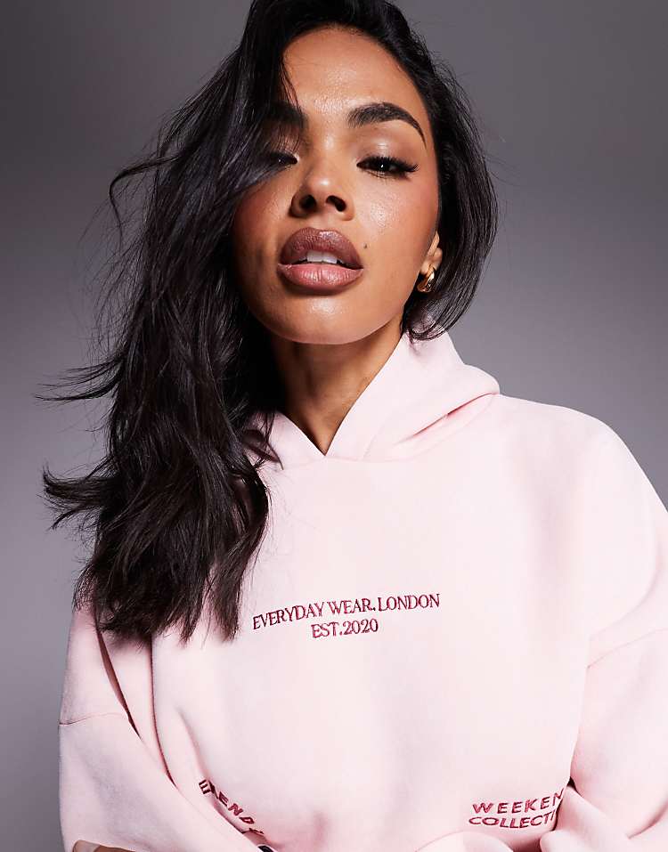 https://images.asos-media.com/products/weekend-collective-hoodie-with-bright-pink-label-detail-in-washed-pink/208832015-3?$n_750w$&wid=750&fit=constrain