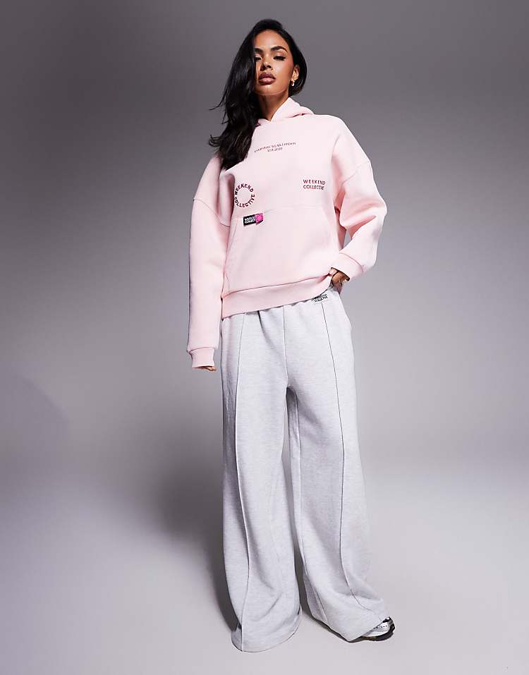 https://images.asos-media.com/products/weekend-collective-hoodie-with-bright-pink-label-detail-in-washed-pink/208832015-4?$n_750w$&wid=750&fit=constrain