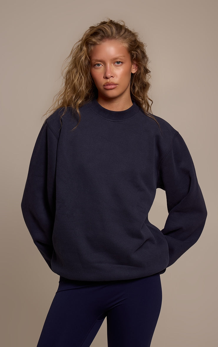 https://cdn-img.prettylittlething.com/3/1/1/b/311b2efd43dc7de02be92242bf6cd2f2bb95530b_CNO0220_1_navy_cotton_fleece_pullover_sweatshirt.jpg