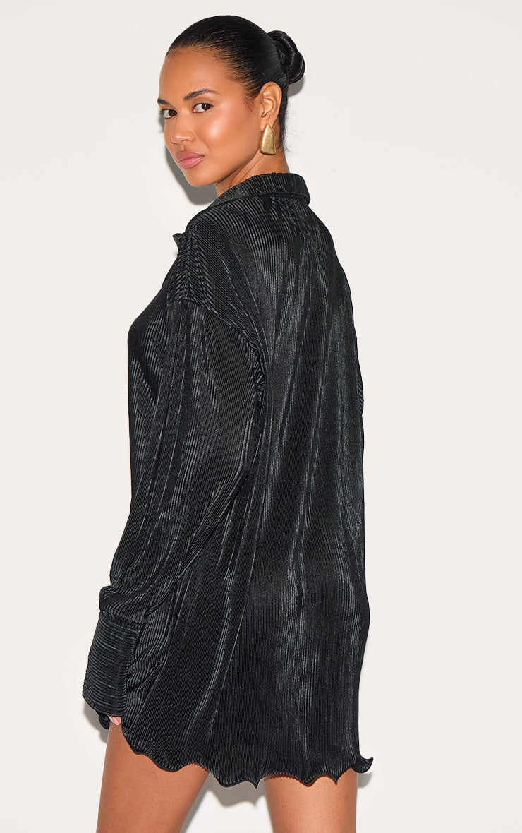 https://cdn-img.prettylittlething.com/4/1/a/7/41a7222cc1e9da5d733ff7995e20fe8fed638a02_CMY2177_2_black_plisse_frill_hem_shirt_dress.jpg