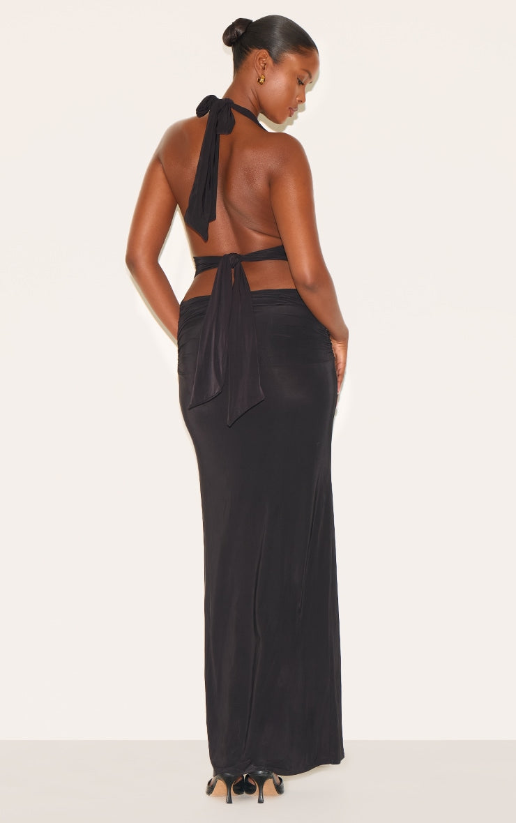 https://cdn-img.prettylittlething.com/5/6/0/6/5606a99ce635339822e99dcad496ef44ea161478_CNG6266_2_black_slinky_extreme_plunge_maxi_dress.jpg