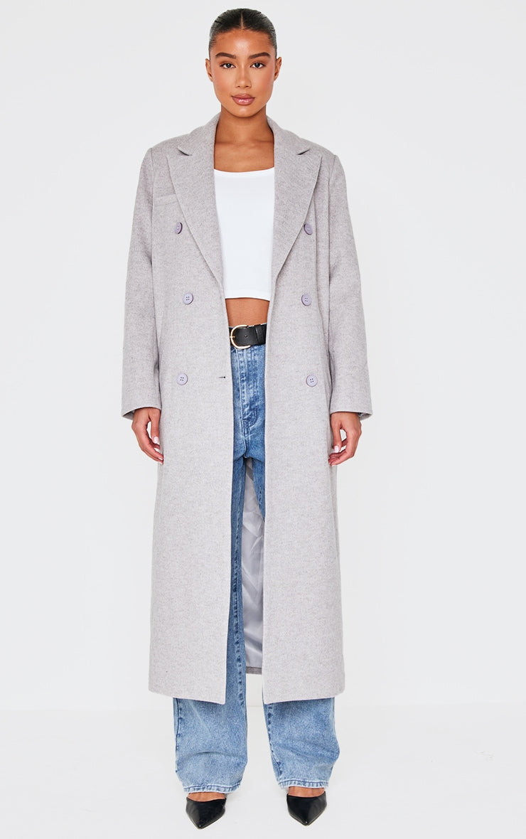 https://cdn-img.prettylittlething.com/5/9/7/e/597eb416cc92fc7c0a25dcd87825804bfe85b869_CNL5154_1_light_grey_wool_look_oversized_drop_shoulder_maxi_coat.jpg