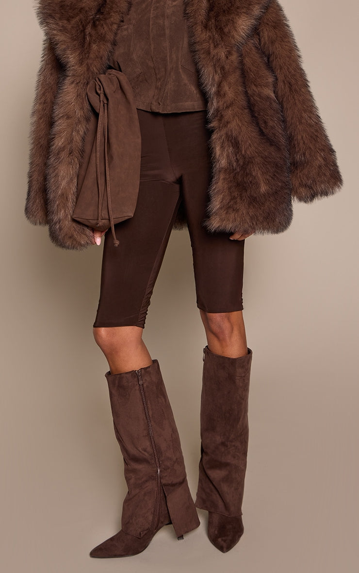 https://cdn-img.prettylittlething.com/c/6/b/8/c6b8887df6b1f6fefb790dca0d41b454b8475761_CNP8645_1_chocolate_faux_suede_stiletto_foldover_knee_high_boots.jpg