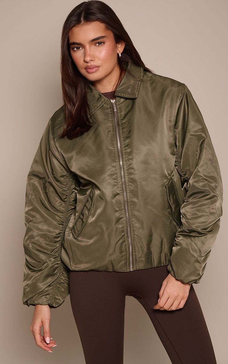 https://cdn-img.prettylittlething.com/c/c/c/1/ccc10361206a25ee391be9ef63377d5827232786_CNP1945_1_olive_oversized_cocoon_sleeve_bomber_jacket.jpg