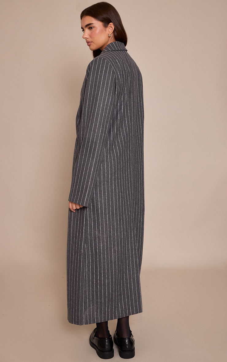 https://cdn-img.prettylittlething.com/f/d/0/7/fd071cf8254436e0659425249d53a7525c092f2e_CNP2520_2_grey_pinstripe_wool_look_coat.jpg